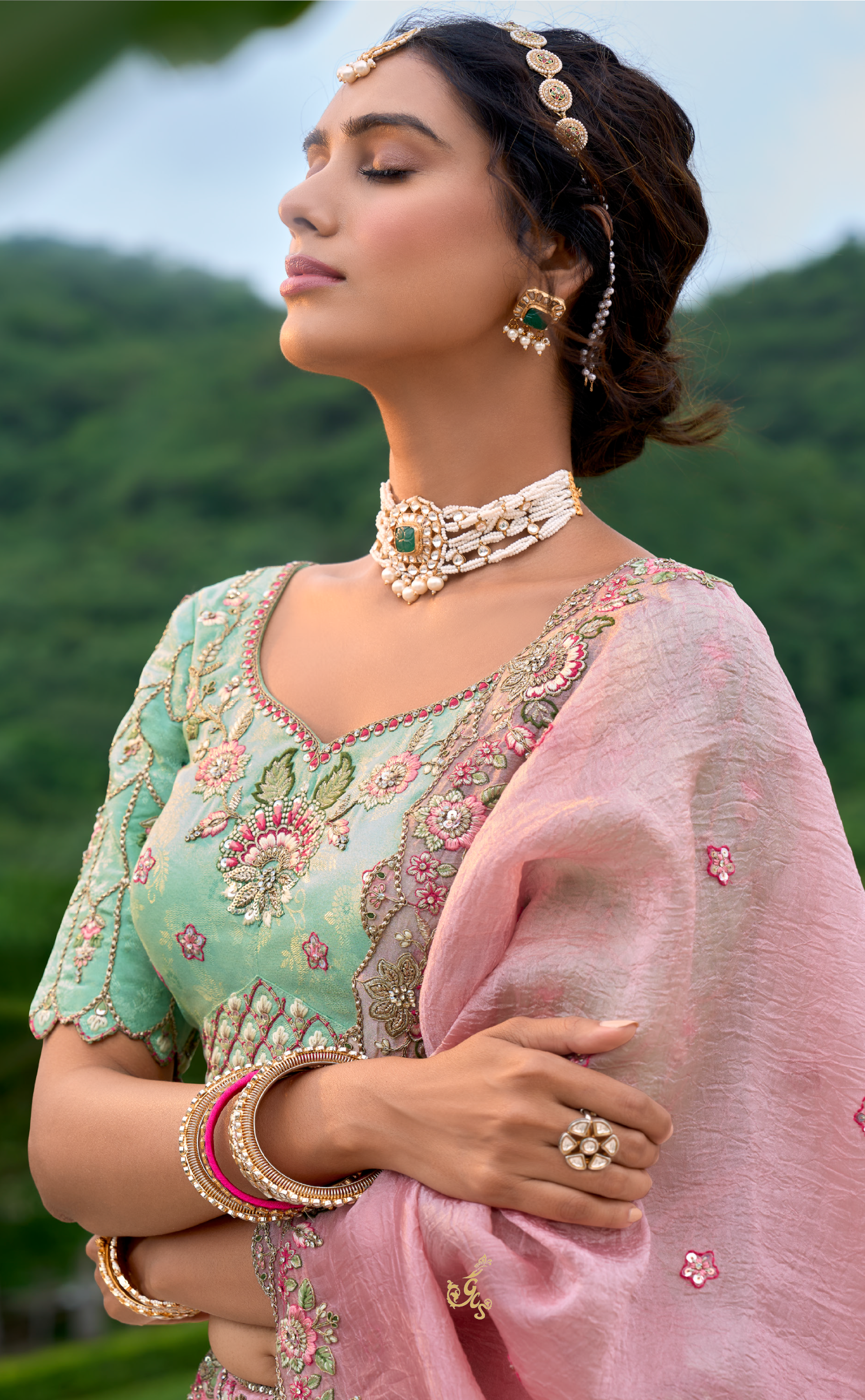 Seagreen and pink Vegan Banarasi silk lehenga with meenakari work.