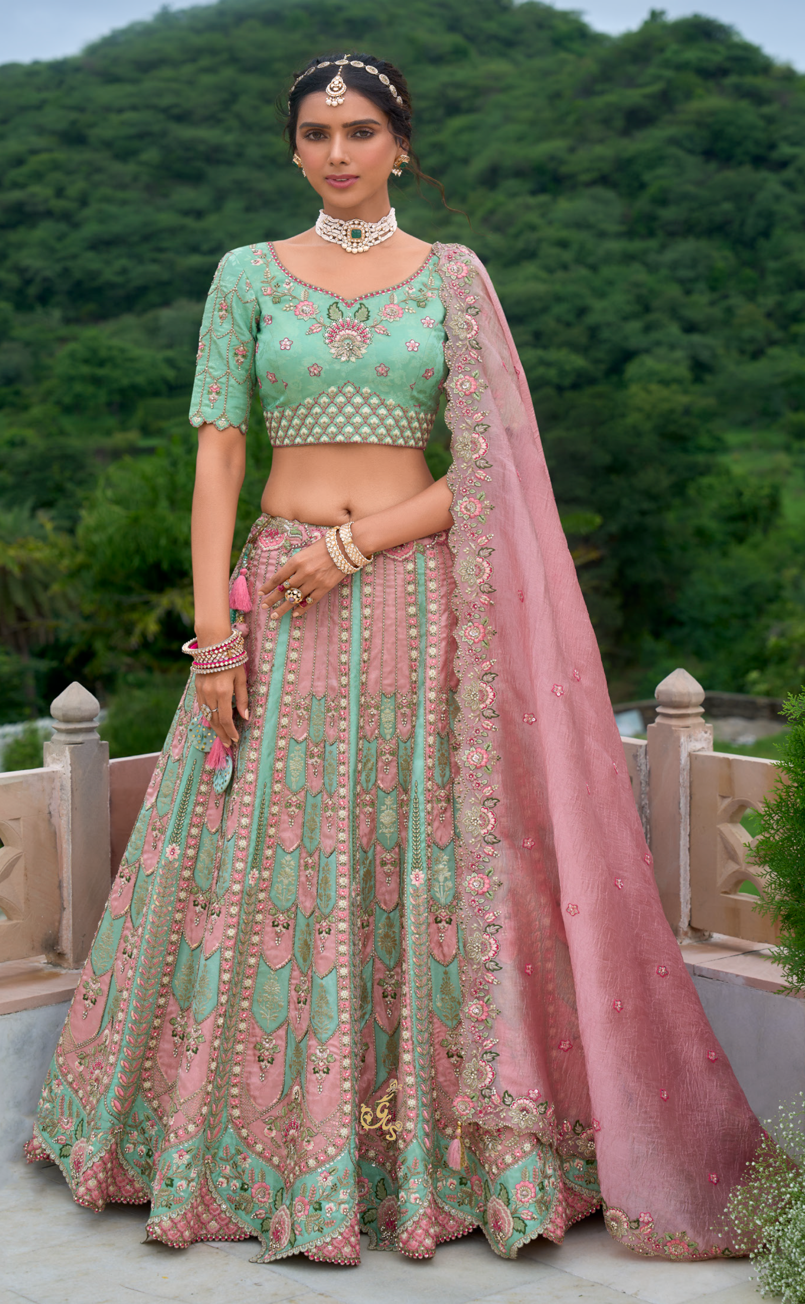 Seagreen and pink Vegan Banarasi silk lehenga with meenakari work.
