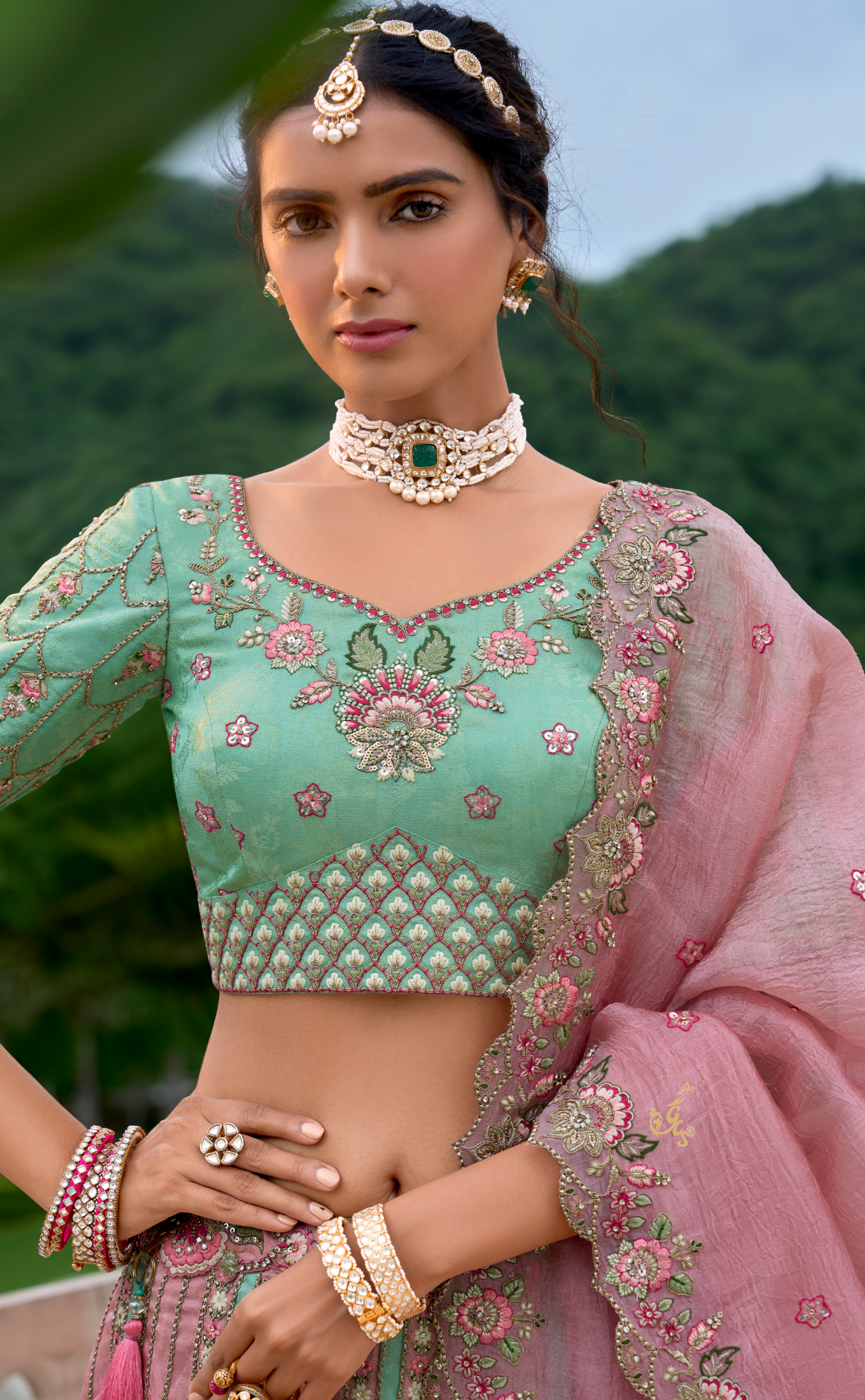 Seagreen and pink Vegan Banarasi silk lehenga with meenakari work.